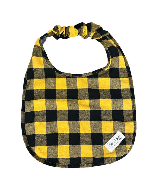 Black and yellow tartan bib